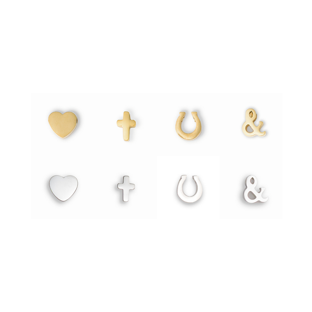 Heart, cross, horseshoe, and ampersand charms in silver and gold