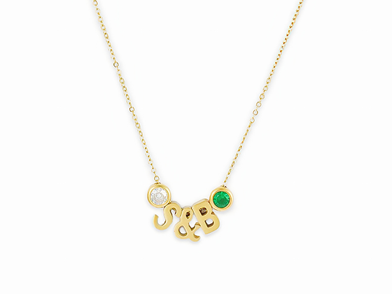 Gold charm necklace with two birthstones and letter charms